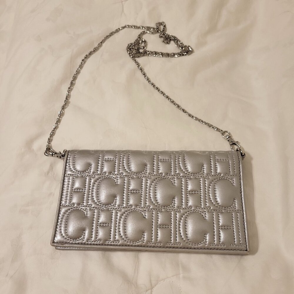Authentic Metallic Silver Monogram Carolina Herrera Leather Jerry Clutch